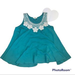 Entro turquoise swing top with crochet neckline detail